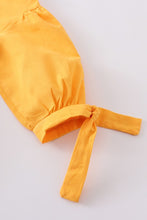 Load image into Gallery viewer, Mustard ruffle dress with bow on sleeve
